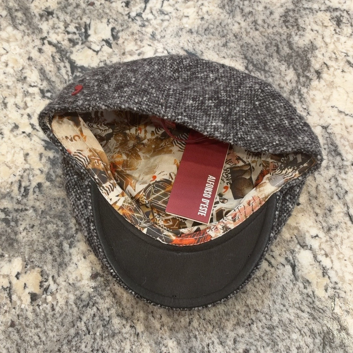 Rudy flat cap 47640 patterned lining and genuine leather underbrim