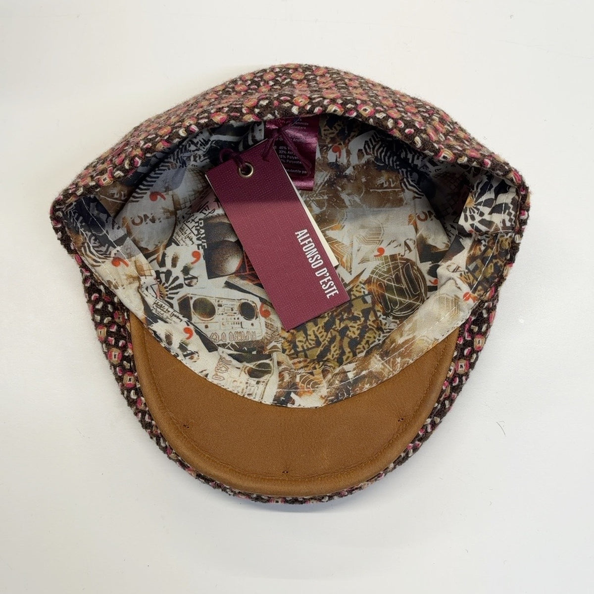 Rudy 49743 patterned lining and tan leather underbrim