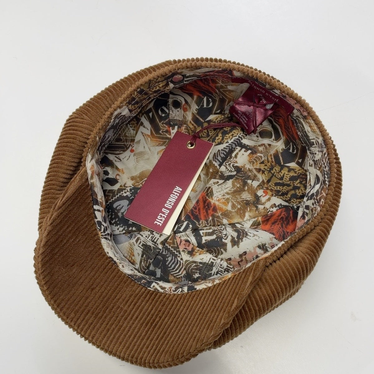 Patterned interior of Alfonso D’Este Sinisa corduroy newsboy cap 51634