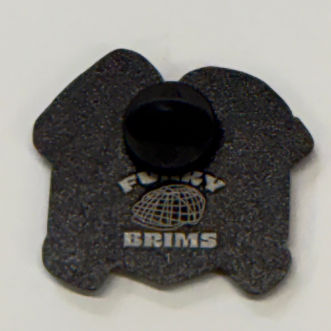 Black rubber bushing with 'Floy' branding on a white background