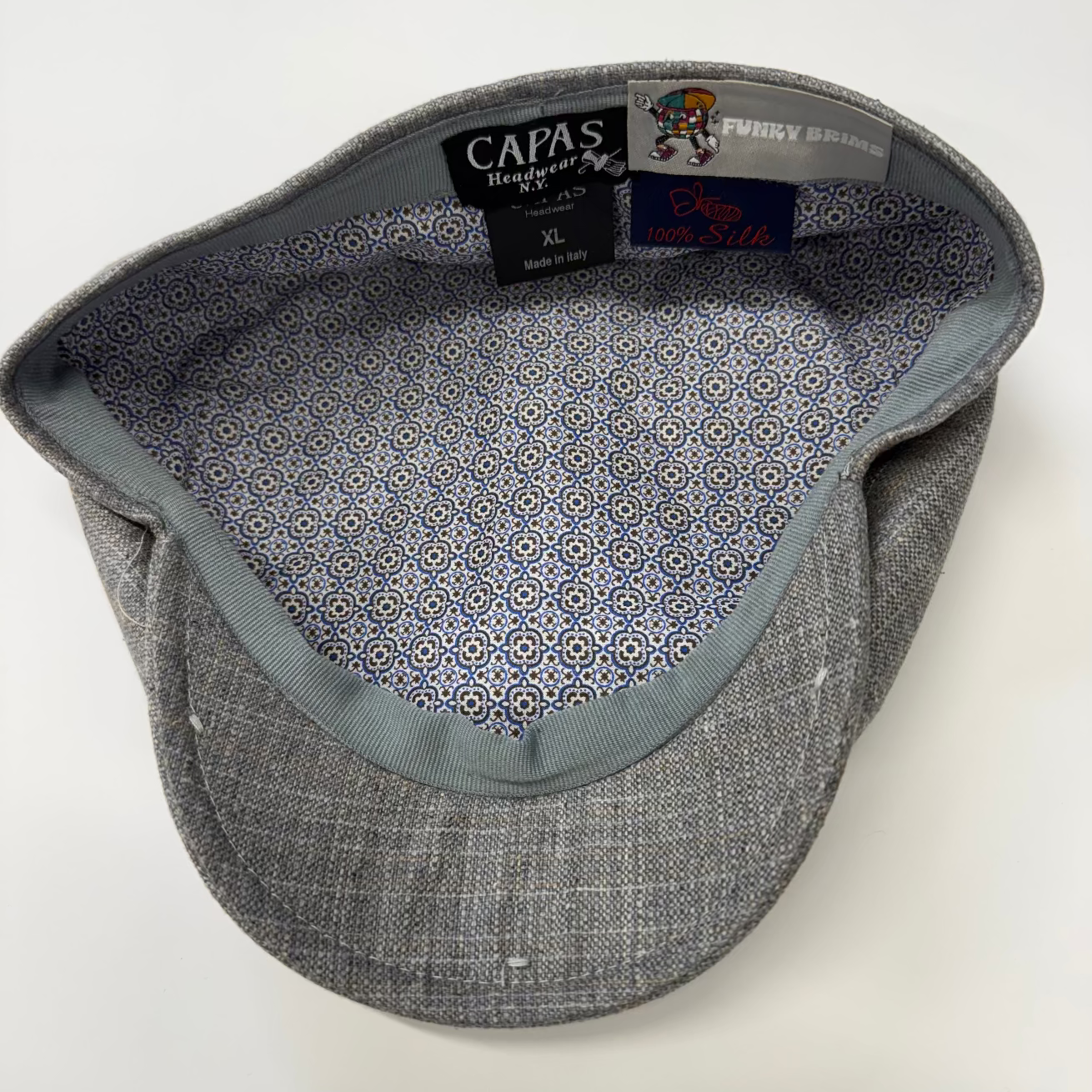 Como Pewter Silk Newsboy Cap from FunkyBrims in Gray / Silver.