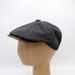 The "RainRunner" - Black Newsboy Cap by Hologramme Paris