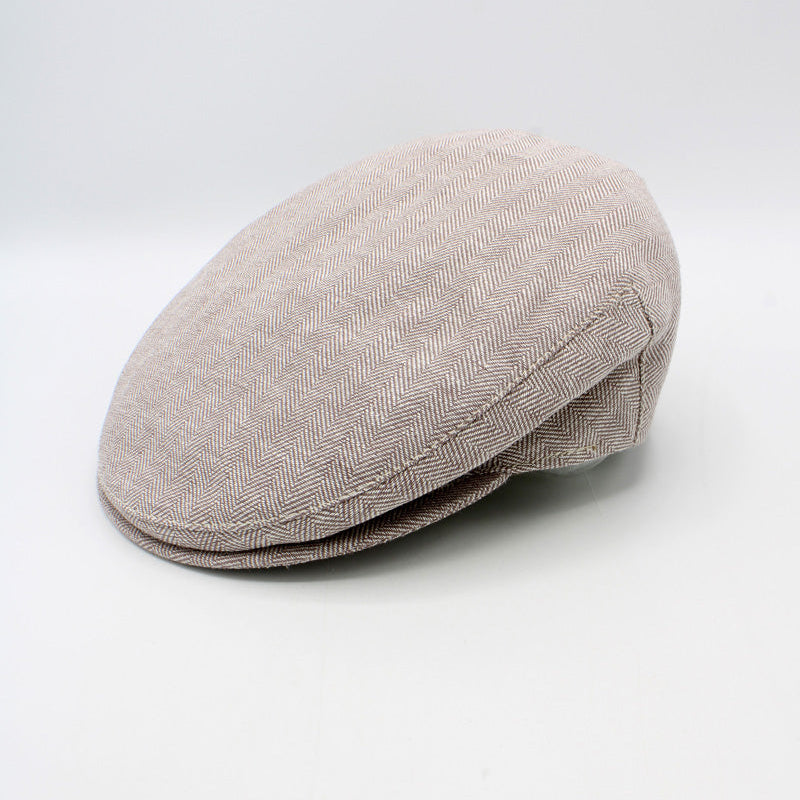 Beige flat cap on a white background