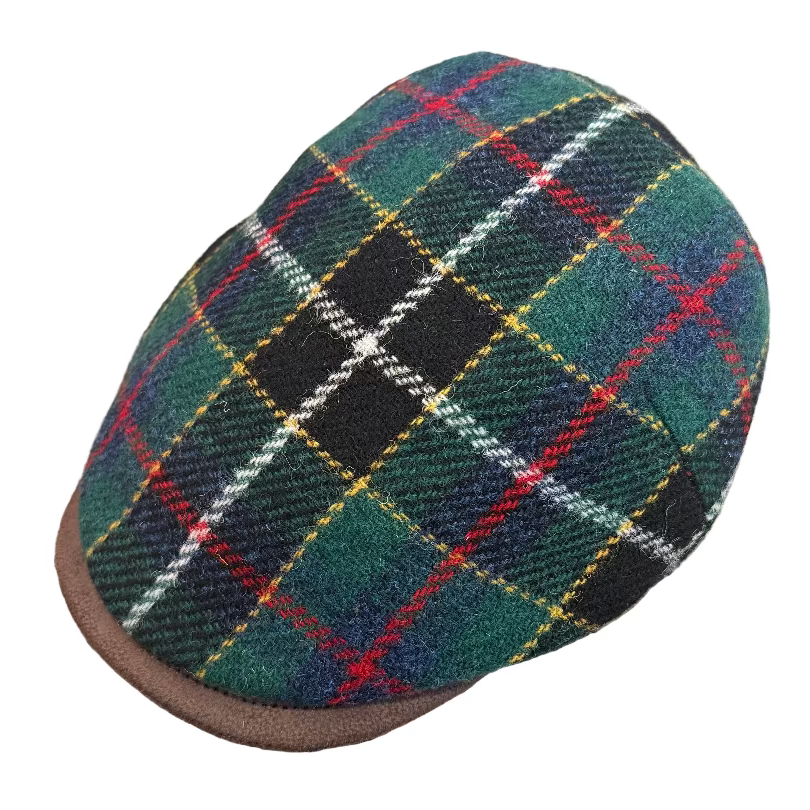 Plaid Harris tweed flat cap with green, red, and black pattern at FunkyBrims.