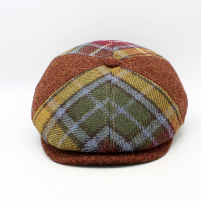 Plaid patterned cap on a white background