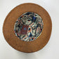Interior of Potenza fedora 35713 showing orange herringbone underbrim and music-themed printed lining