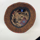 Interior of Alfonso D'Este Nanni patchwork bucket hat 35969 showing printed lining and brown textured underbrim