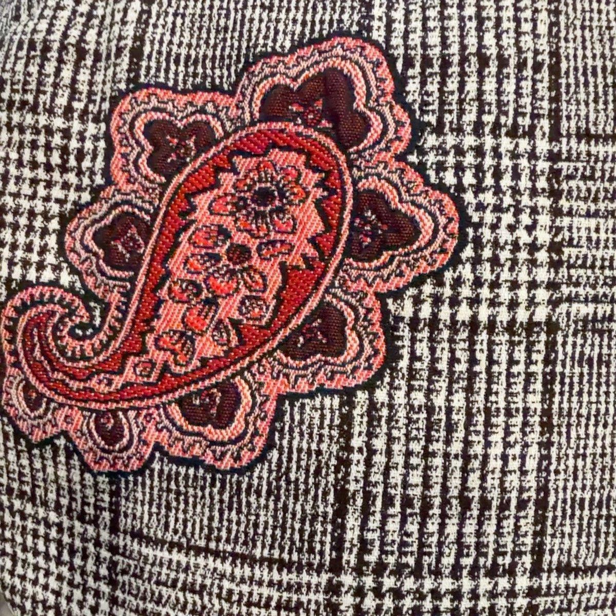Close-up of red paisley and black-and-white check fabric on cap 42108