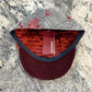 Interior of Alfonso d’Este 42108 with red lining and burgundy underbrim