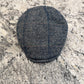 Top view of Ionio herringbone flat cap with subtle windowpane check