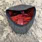 Ionio flat cap interior showing red lining and matching fabric underbrim