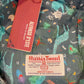 Harris Tweed certification label on patterned cap lining