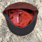 Red lining and black underbrim of Bristol flat cap 47530