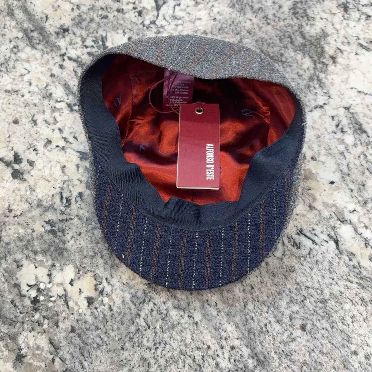 Red lining and navy striped underbrim of Hannover cap 47534