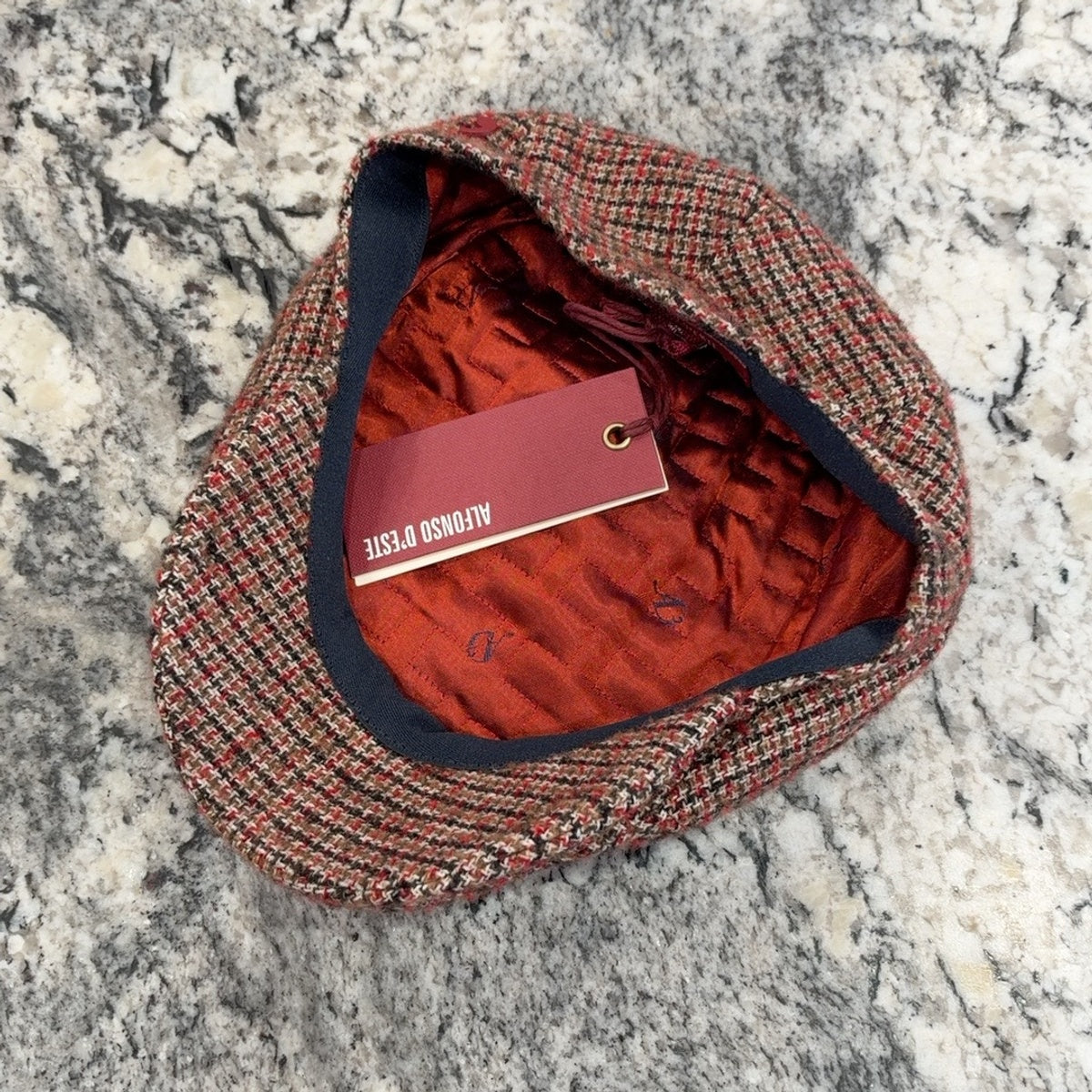 Kent cap interior with red lining and matching check fabric underbrim