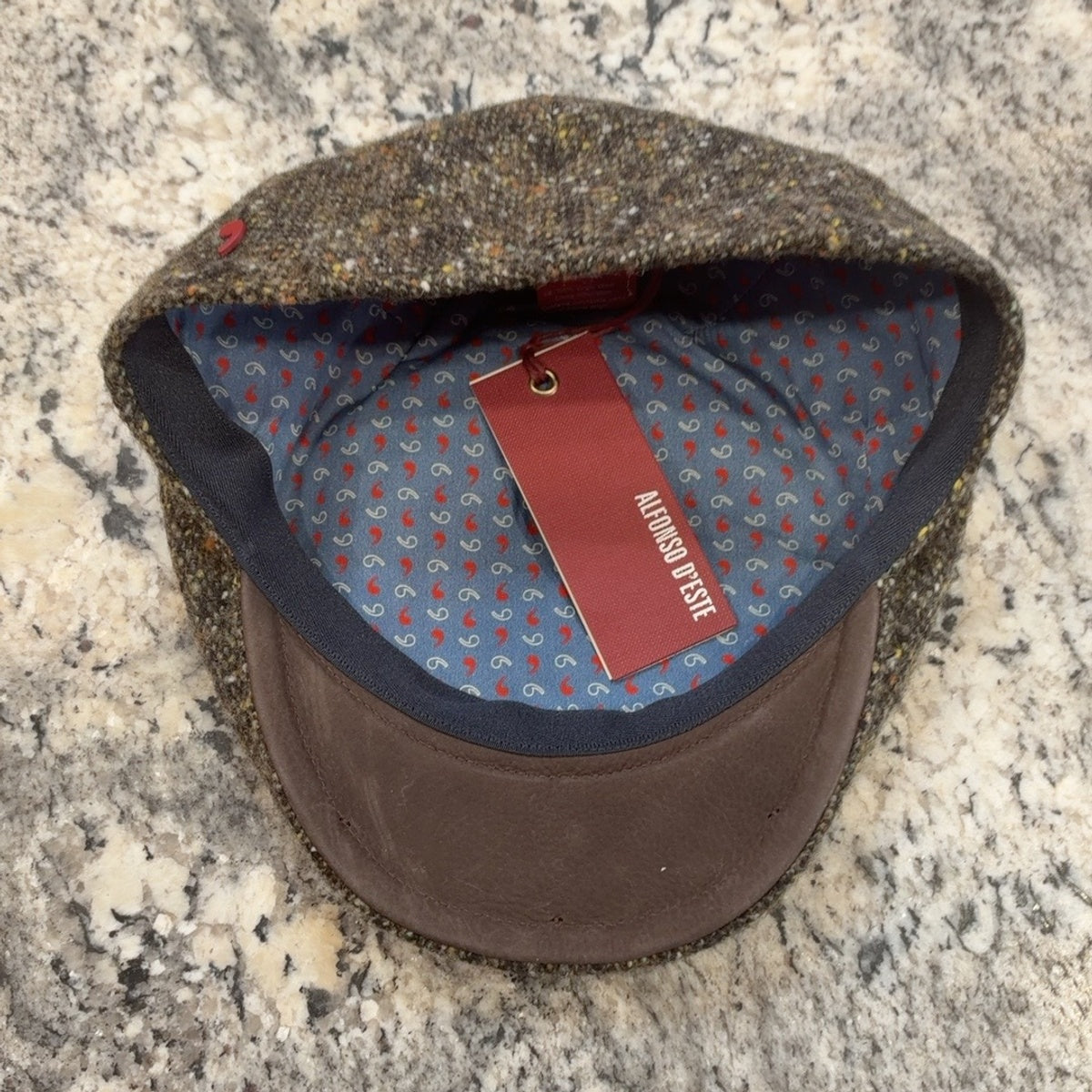 Alfonso D'Este charcoal flecked wool Rudy flat cap 51172, patterned lining and brown leather underbrim