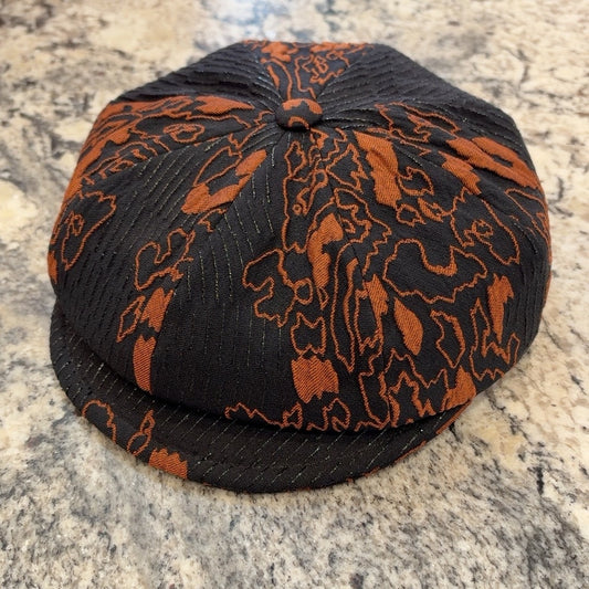 Alfonso d’Este Krizia black and burnt orange floral newsboy cap 52066, front view