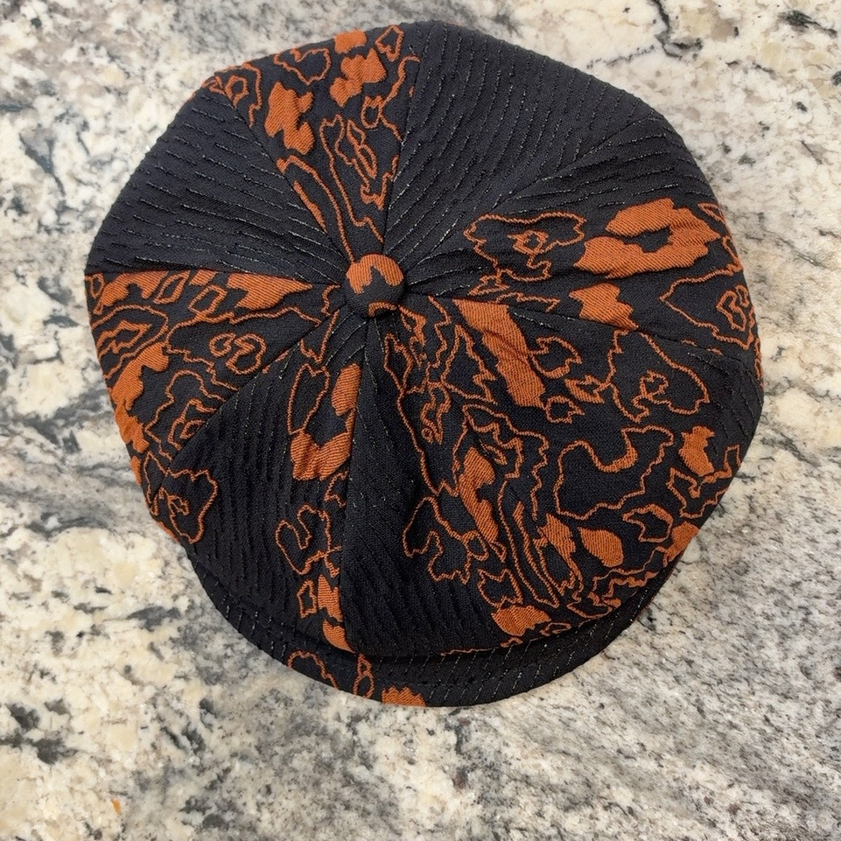 Alfonso d’Este Krizia cap 52066 showing eight-panel crown and metallic stripes
