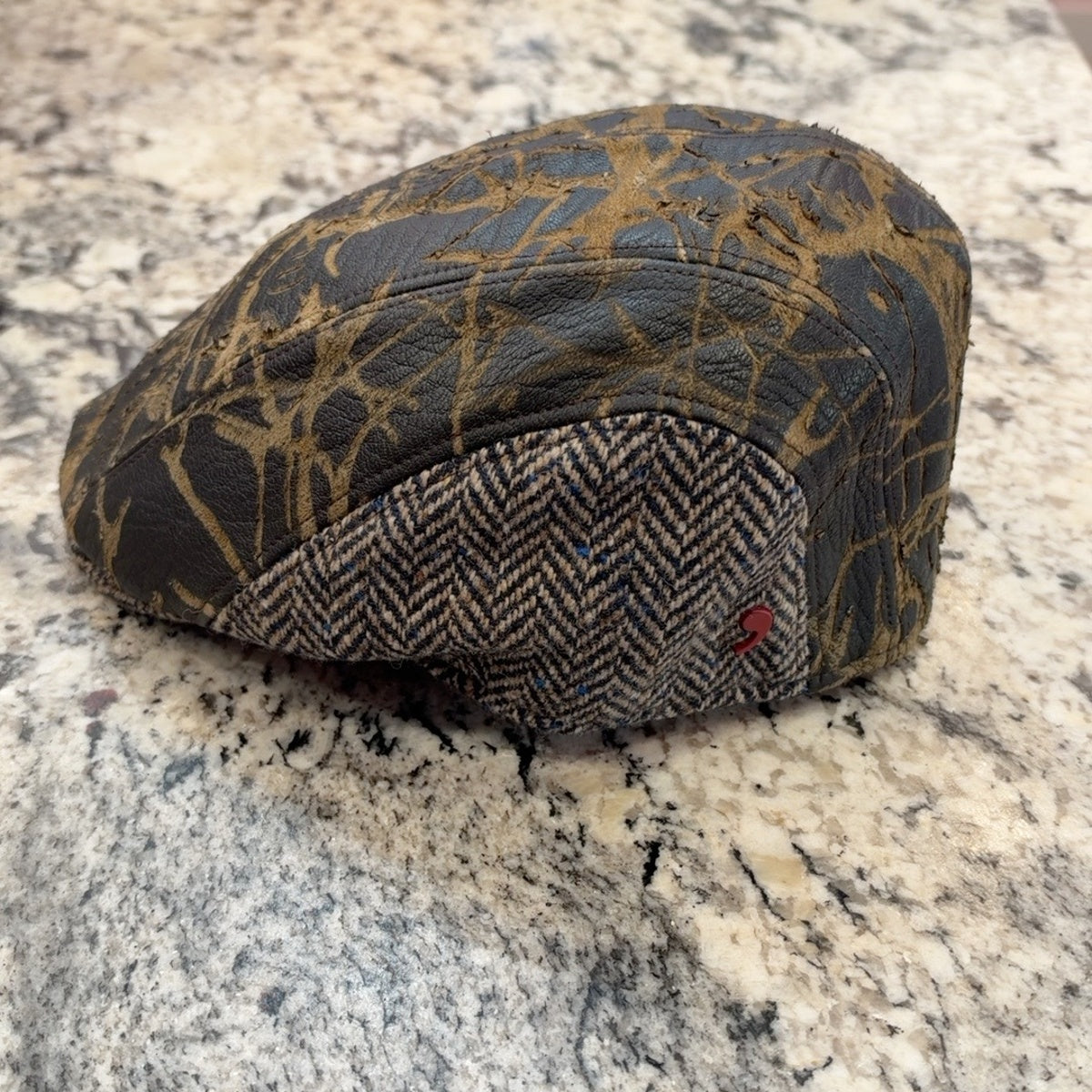 Alfonso d’Este John cap 52422 showing wool herringbone side panel