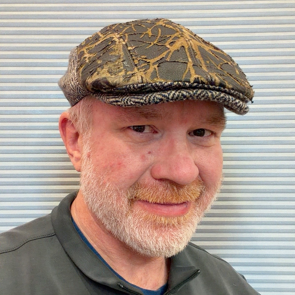 Alfonso d’Este John distressed leather flat cap 52422 worn on a model