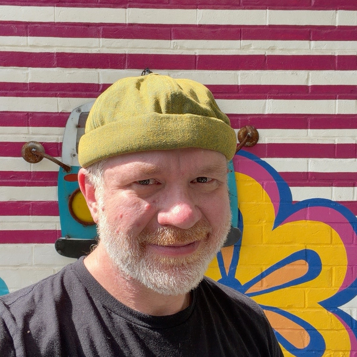 Green denim Docker cap 52454 worn with the rolled edge