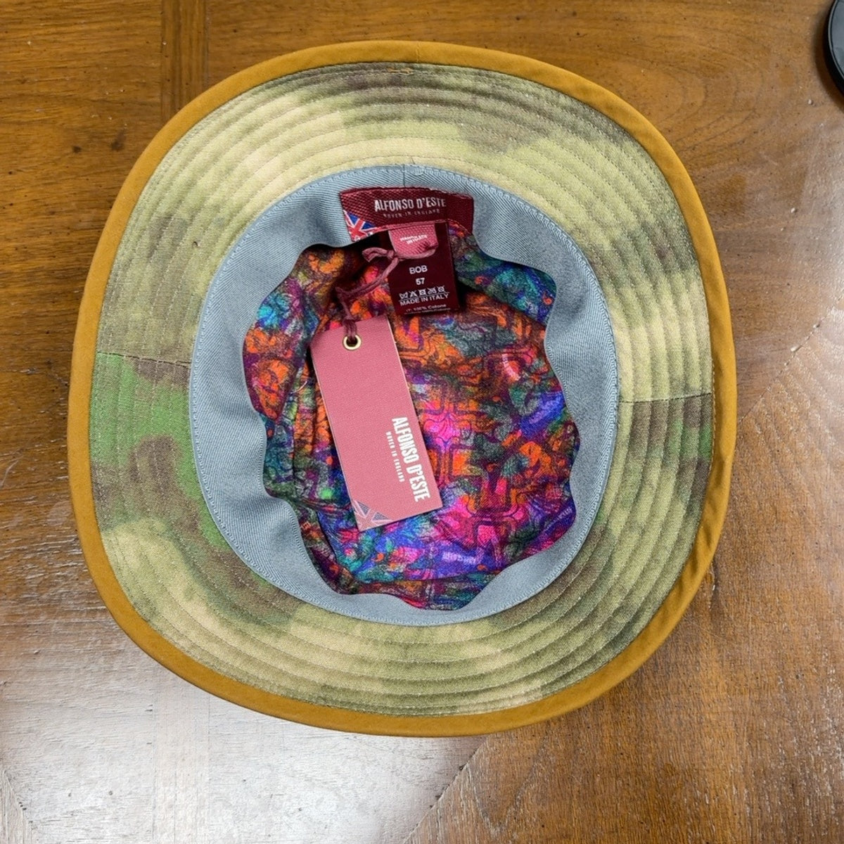British camo bucket hat interior with colorful abstract lining