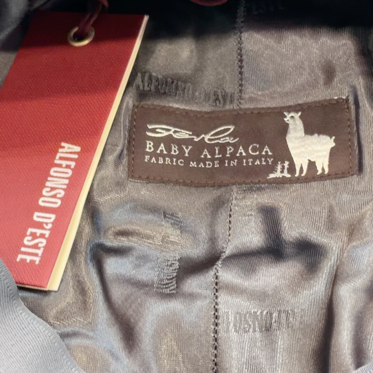 Ferla baby alpaca fabric label inside Alfonso d’Este cap 52493