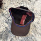 Interior of Alfonso d’Este 52901 showing adjustable snapback and branded sweatband