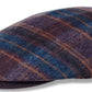 A flat cap made of textured wool in a dark blue, purple, and brown plaid pattern, shown against a plain white background.