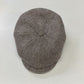 Top view of Alfonso D'Este Kyoto newsboy cap 54147 with taupe and cream herringbone and subtle flecks
