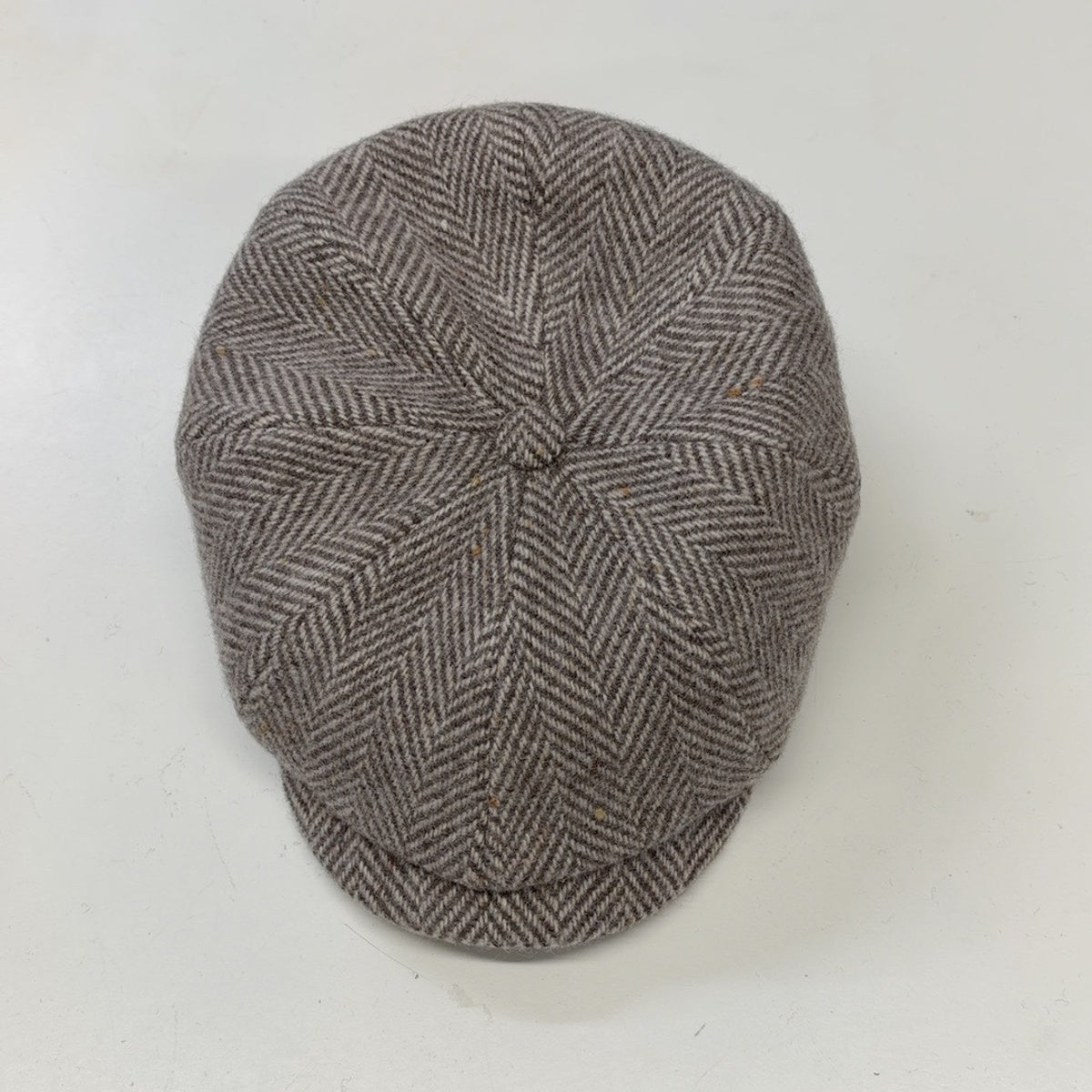Top view of Alfonso D'Este Kyoto newsboy cap 54147 with taupe and cream herringbone and subtle flecks