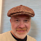 Alfonso d’Este Kyoto burgundy herringbone virgin wool newsboy cap 54804, shown worn