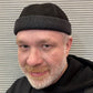 Alfonso d’Este black leather and charcoal Docker cap 55527 worn on a model