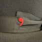 Black ribbon and red emblem detail