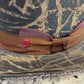 Cilindro 56053 distressed leather texture and brown ribbon detail