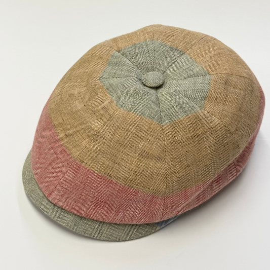 Multicolored cap with a geometric pattern on a white background