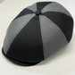 Black and gray checkered cap on a white background