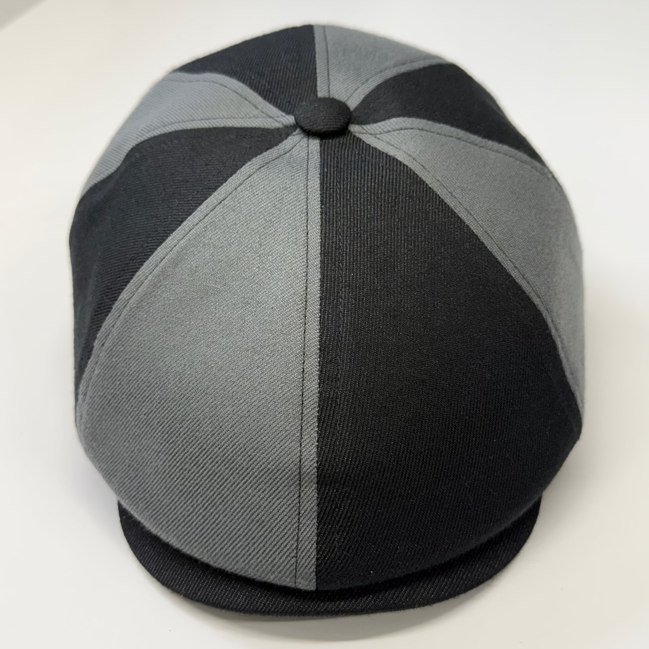 Black and gray cap on a white background