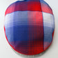 Red and blue plaid fabric on a white background
