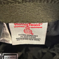 Harris Tweed label on a fabric background at FunkyBrims