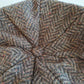 The Eight Piece Tweed Cap in Brown Herringbone by Hanna Hats of Donegal