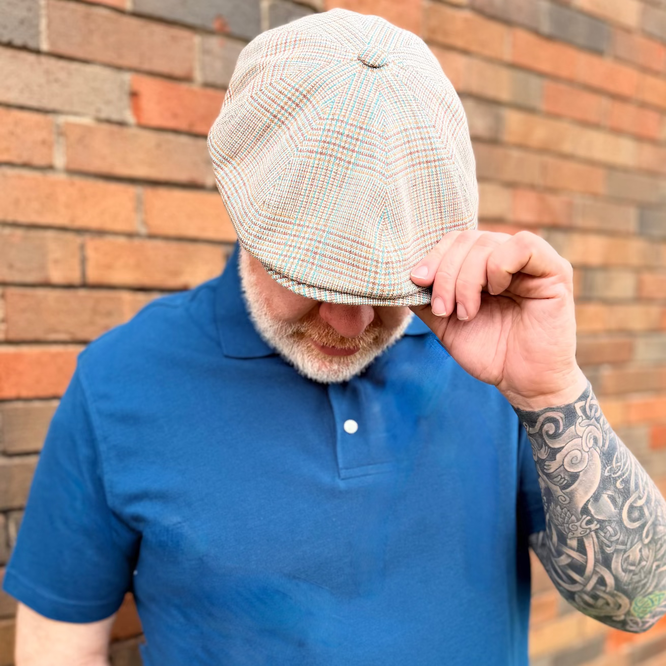 Brown, Tan, blue, and beige newsboy cap by FunkyBrims.