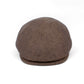 A brown textured flat cap or newsboy-style hat photographed on a clean white background.