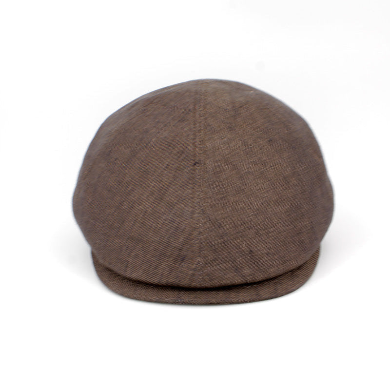 A brown textured flat cap or newsboy-style hat photographed on a clean white background.