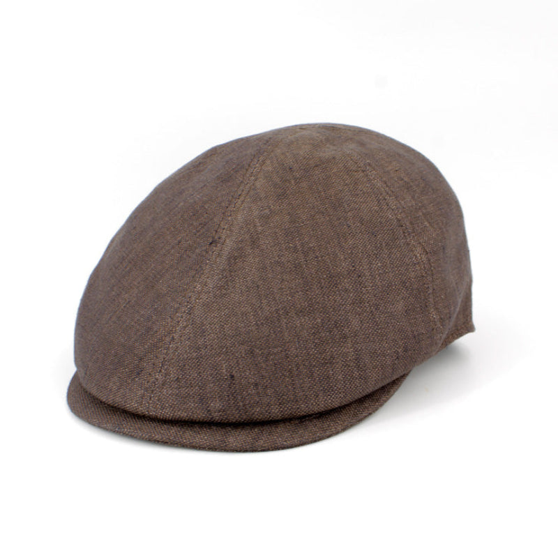 A brown textured flat cap or newsboy-style hat photographed on a clean white background.