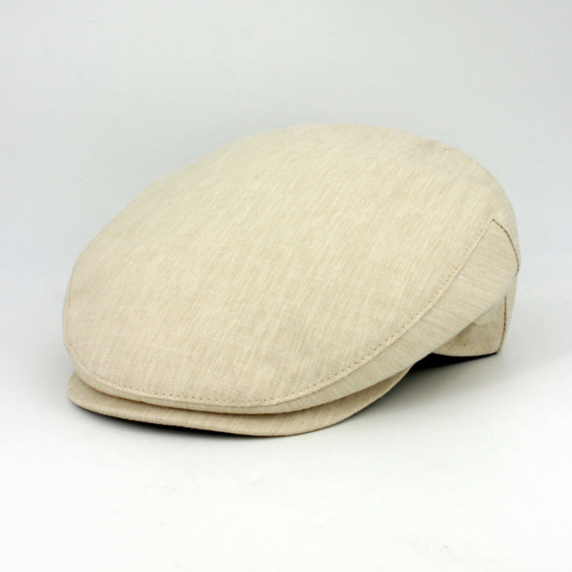 Beige flat cap on a white background
