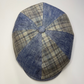 Blue and beige checkered beret on a white background