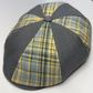 Plaid patterned cap with gray base on a white background