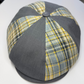 Plaid patterned cap with gray base on a white background