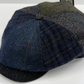 Woven cap with blue and gray pattern on a white background